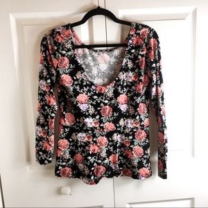 Gorgeous peplum top with a floral pattern